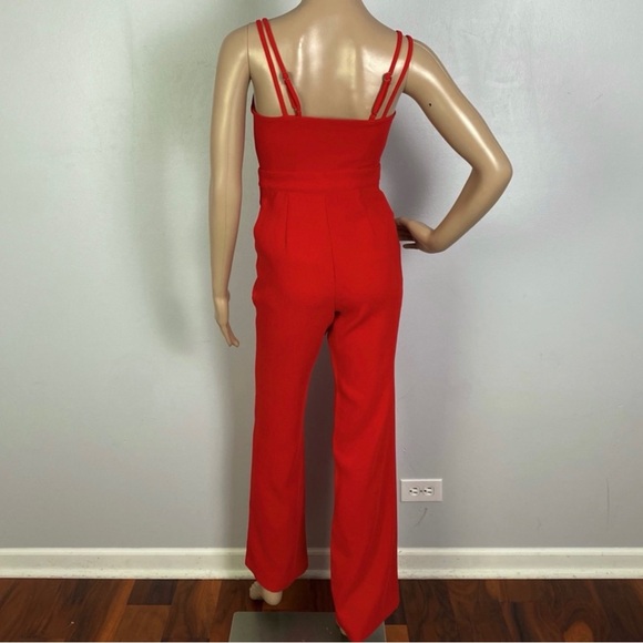 NEW NBD REVOLVE RED BUTTON-FRONT JUMPSUIT - Picture 7 of 7
